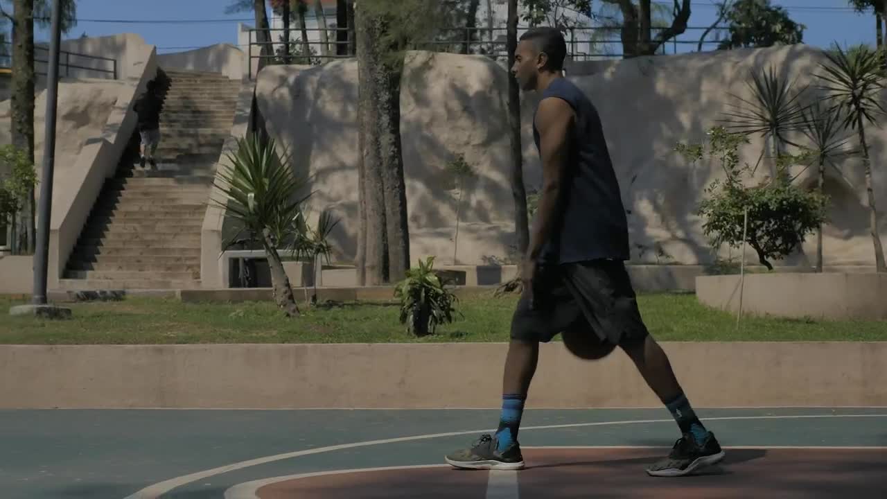 Stock Video Man Bouncing A Basketball Ball Animated Wallpaper