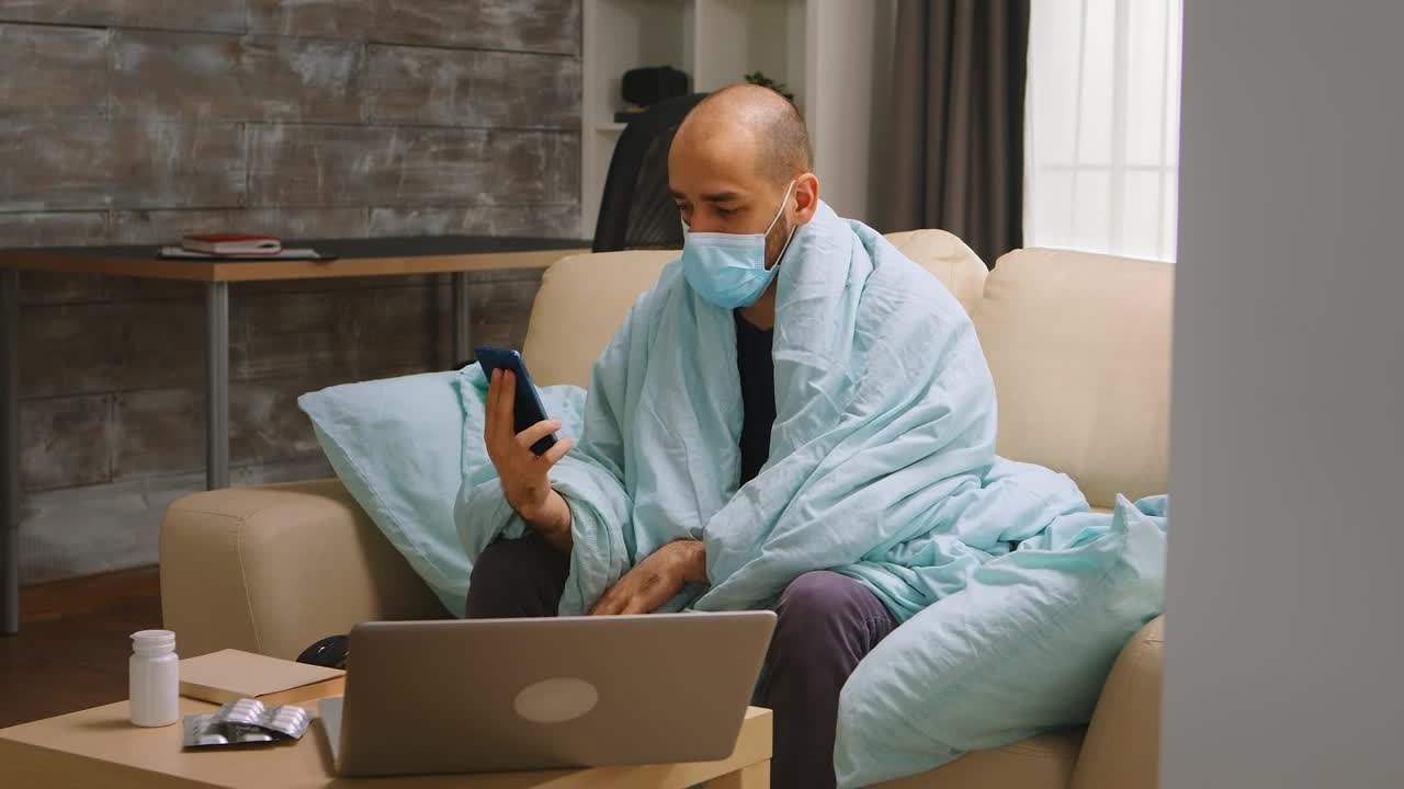 Stock Video Man Asks For Coronavirus Diagnosis On Video Call Animated Wallpaper