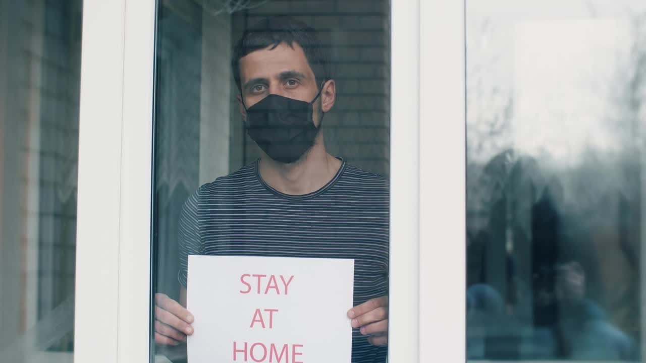 Stock Video Man Asking To Stay Home For Quarantine Animated Wallpaper