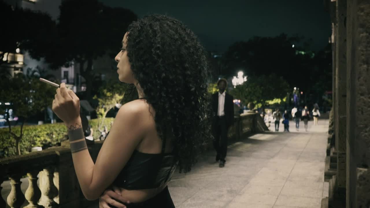 Stock Video Man Approaches A Woman Smoking Animated Wallpaper