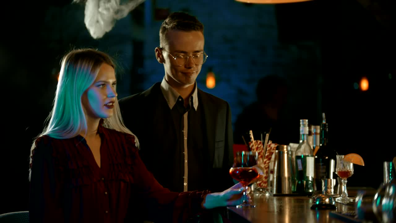 Stock Video Man And Woman Toasting In A Bar Animated Wallpaper