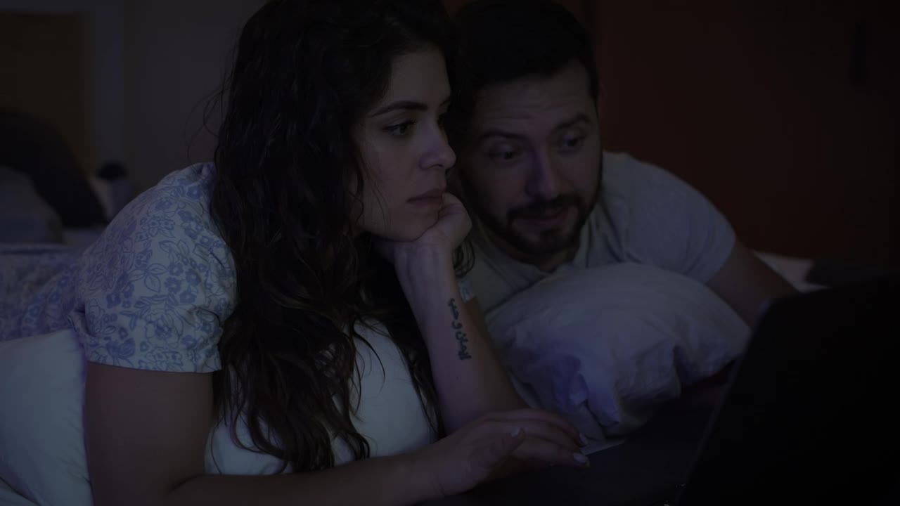 Stock Video Man And Woman Surfing The Internet Together Animated Wallpaper