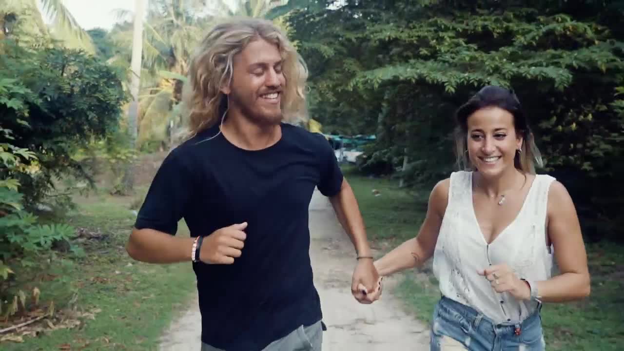 Stock Video Man And Woman Running Happy Hand In Hand Animated Wallpaper