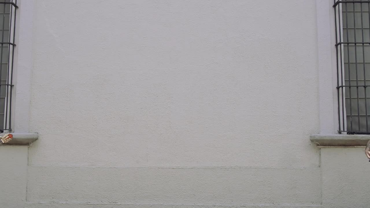 Stock Video Man And Woman Playing Music Approaching The Center Of The Animated Wallpaper