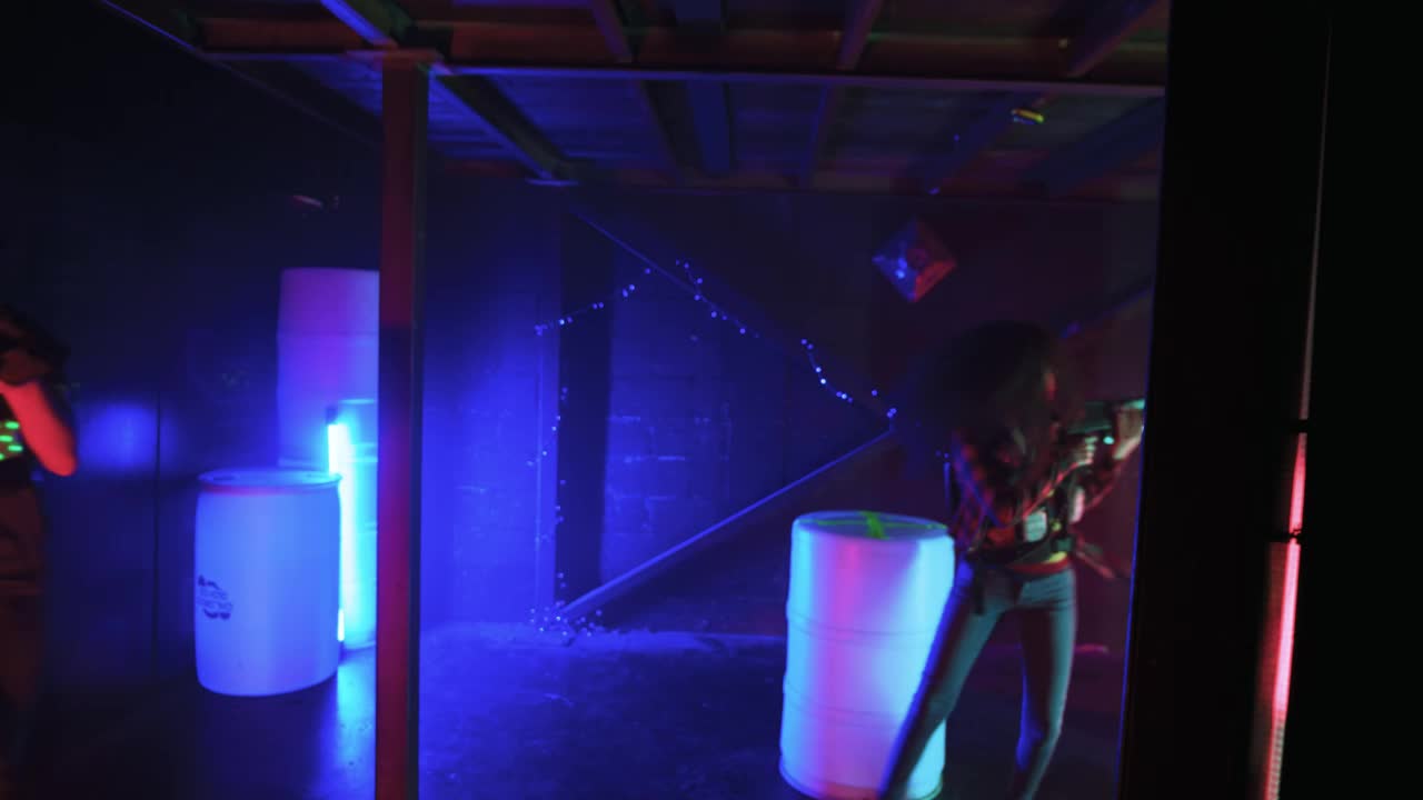 Stock Video Man And Woman Playing Laser Tag Animated Wallpaper