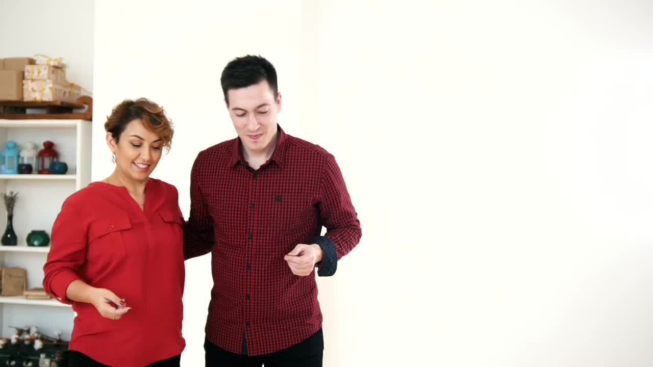 Stock Video Man And Woman Dancing Happily At Home Animated Wallpaper