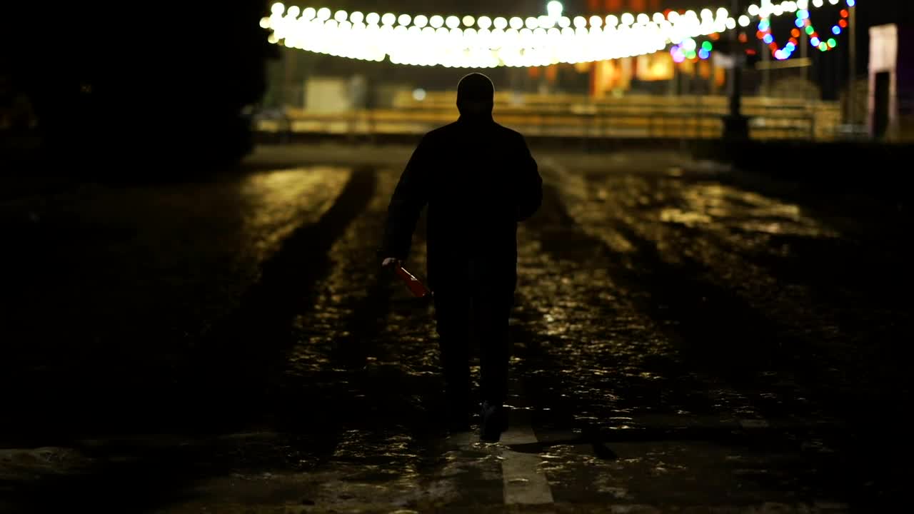Stock Video Malefactor Walking With A Bat Down A Dark Street Animated Wallpaper