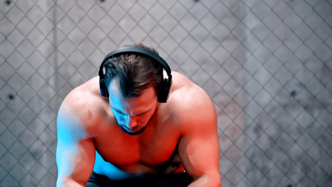 Stock Video Male Boxer Resting Sitting On A Bench At The Gym Animated Wallpaper