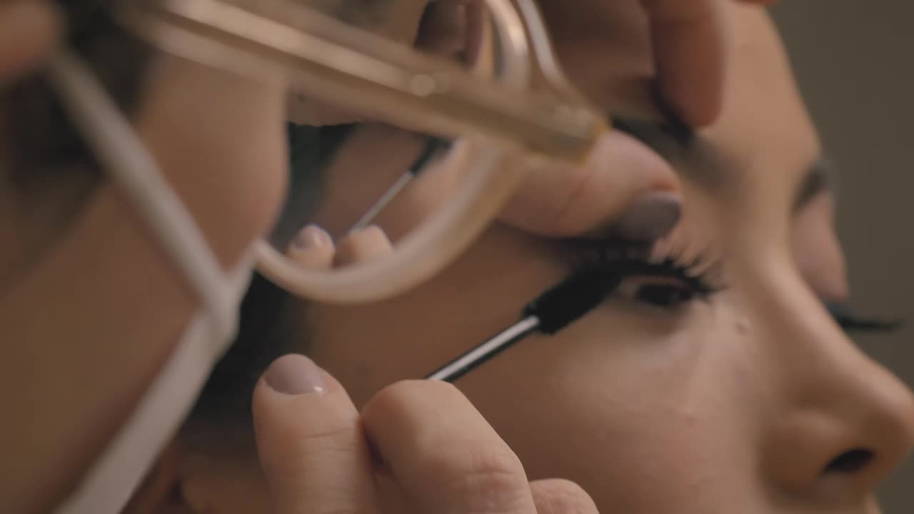 Stock Video Making Up The Look Of A Girl Animated Wallpaper