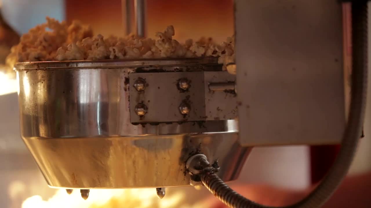 Stock Video Making Popcorn In A Machine Animated Wallpaper