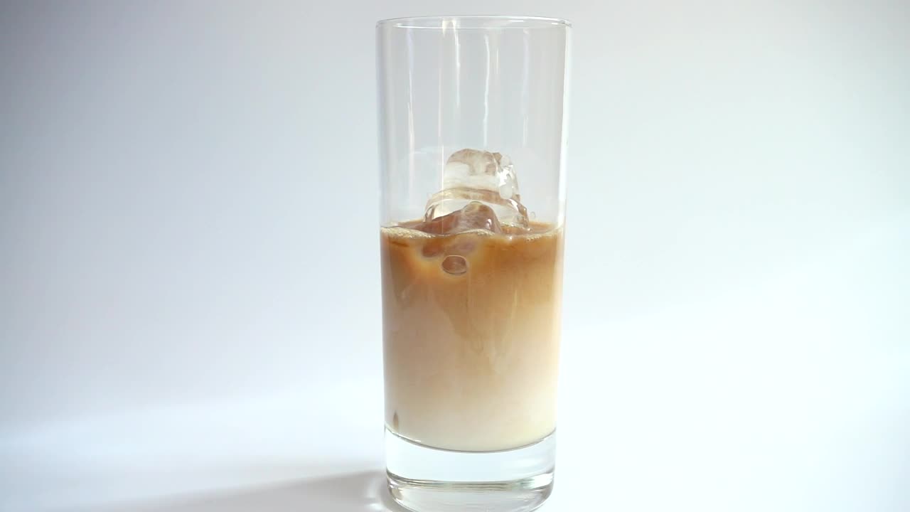 Stock Video Making Cold Coffee With Milk Animated Wallpaper