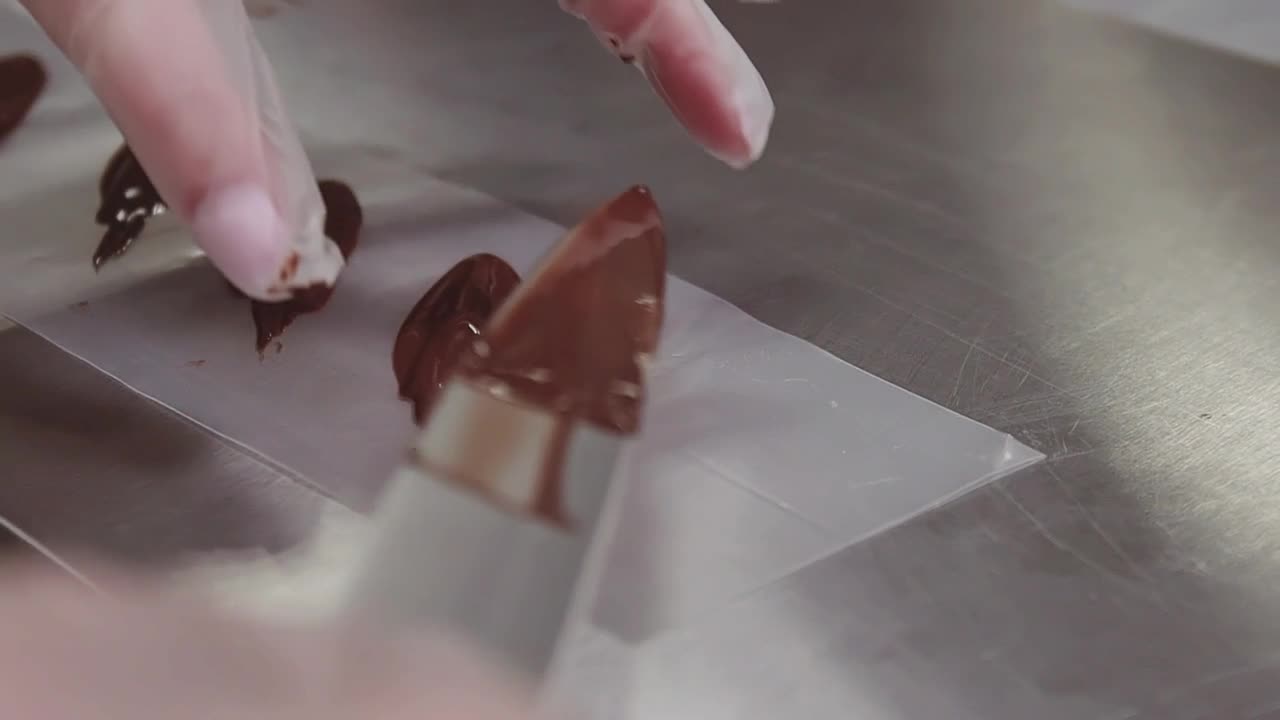 Stock Video Making Chocolate Shapes Animated Wallpaper