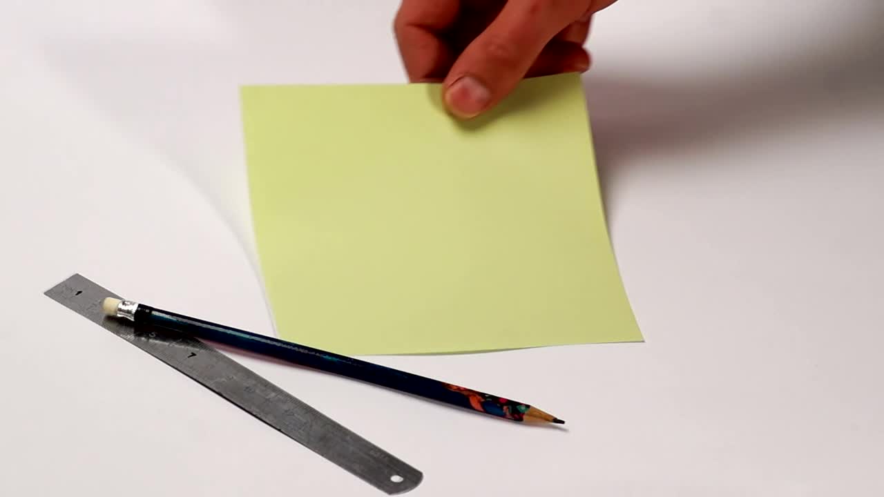 Stock Video Making An Origami Frog Animated Wallpaper