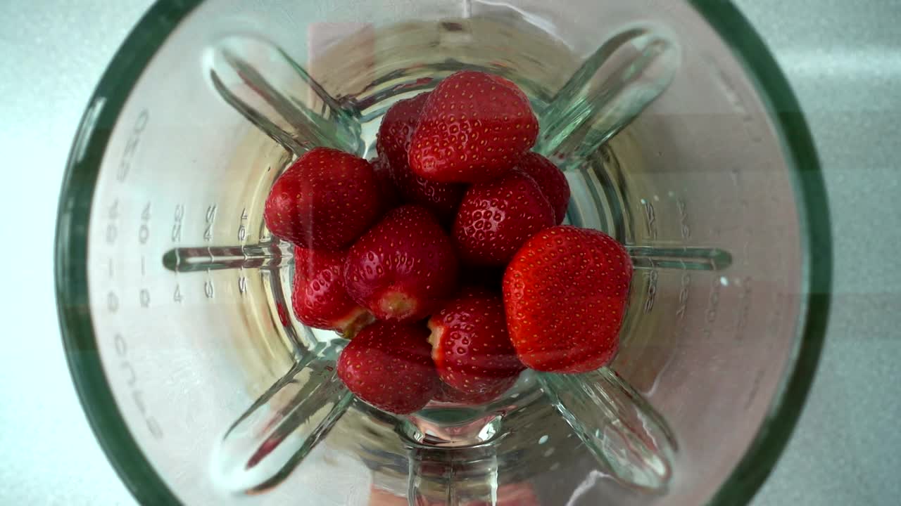 Stock Video Making A Strawberry Smoothie Animated Wallpaper