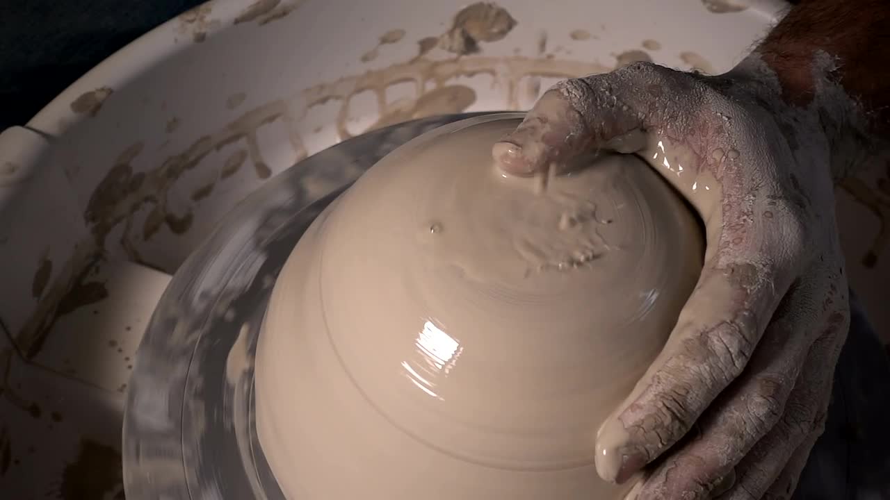 Stock Video Making A Clay Bowl In The Workshop Animated Wallpaper