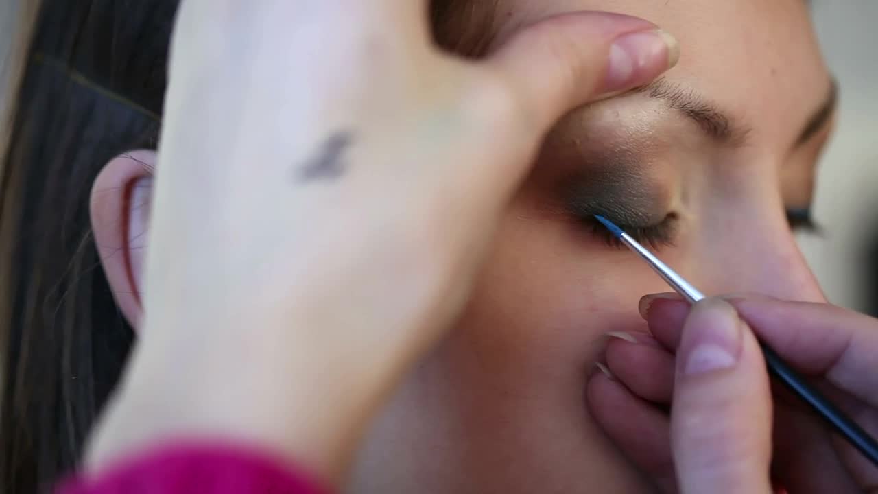 Stock Video Makeup Brush Painting A Woman Eye Animated Wallpaper