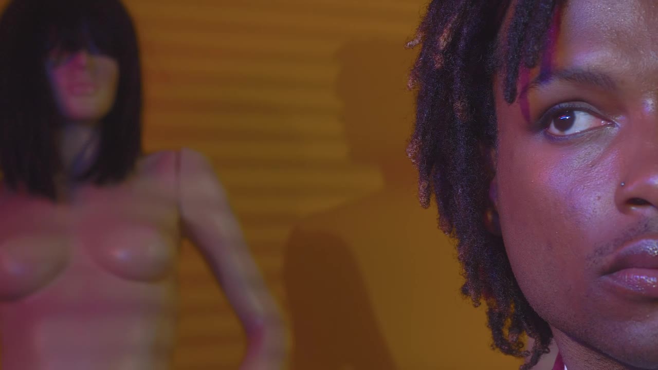 Stock Video Make Up Face Of A Man With Mannequins Behind Animated Wallpaper