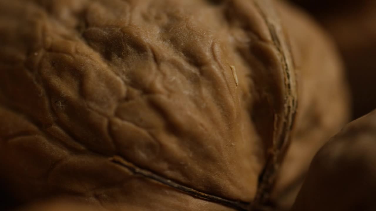 Stock Video Macro Shot Off At Walnuts In The Shell Animated Wallpaper