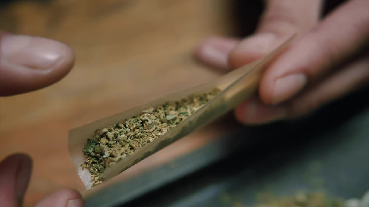 Stock Video Macro Shot Of Preparing A Joint Animated Wallpaper