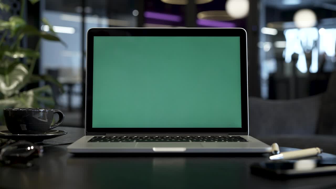 Stock Video Macbook With A Green Screen At The Office Animated Wallpaper