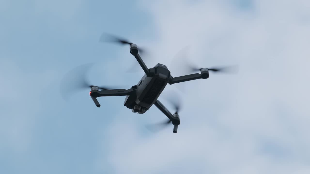 Stock Video Low View Of A Drone Flying Against The Sky Animated Wallpaper