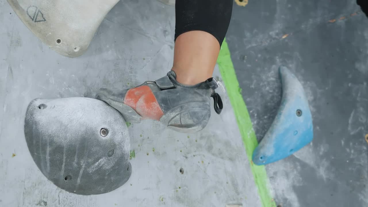 Stock Video Low Girl Climbing Up A Mountaineering Wall Animated Wallpaper