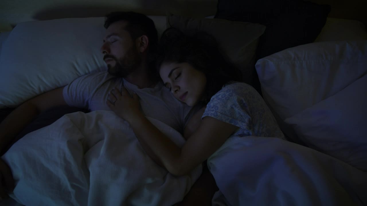 Stock Video Loving Couple Sleeping Together At Night Animated Wallpaper