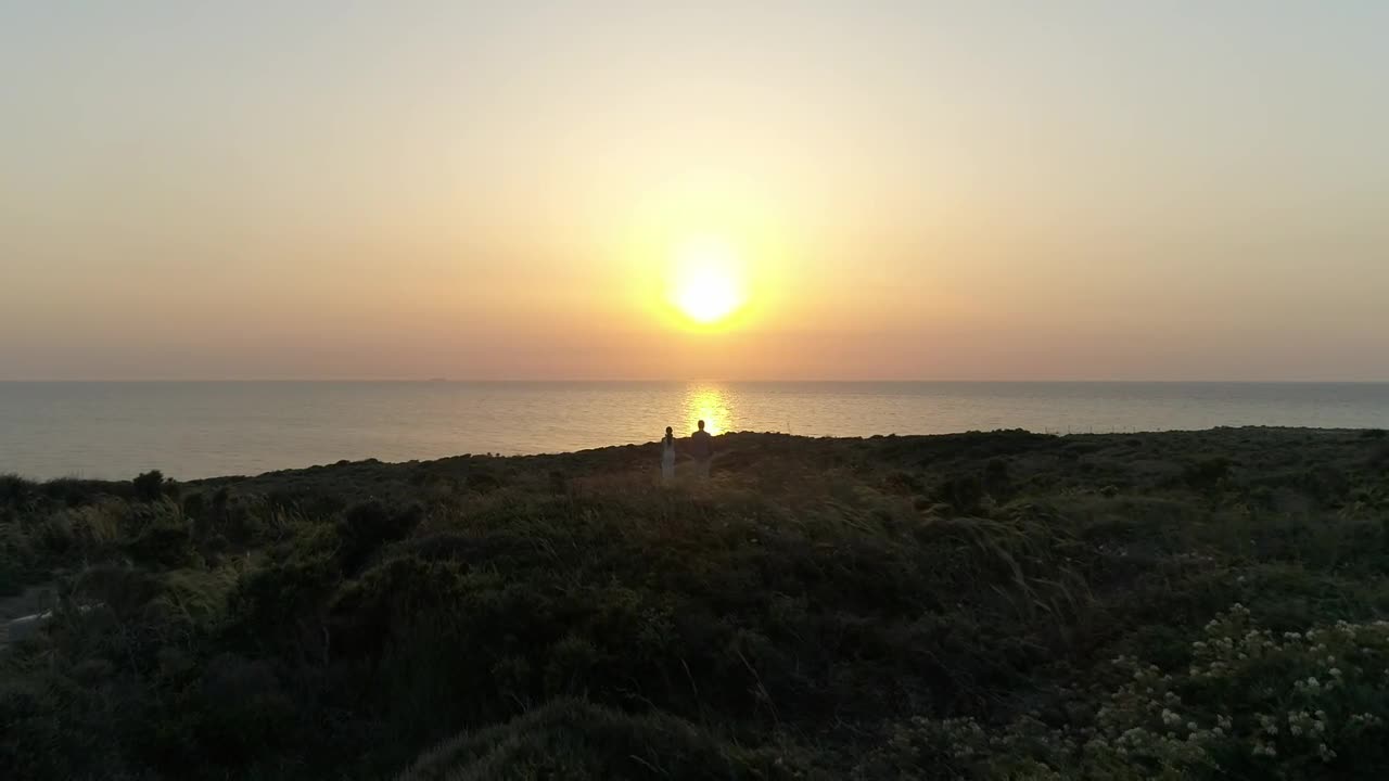 Stock Video Looking Towards The Sunset Over The Coast Animated Wallpaper