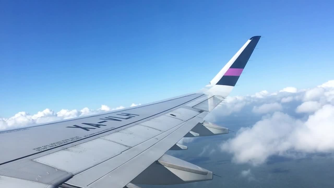 Stock Video Looking At The Sky From The Window Of An Airplane Animated Wallpaper