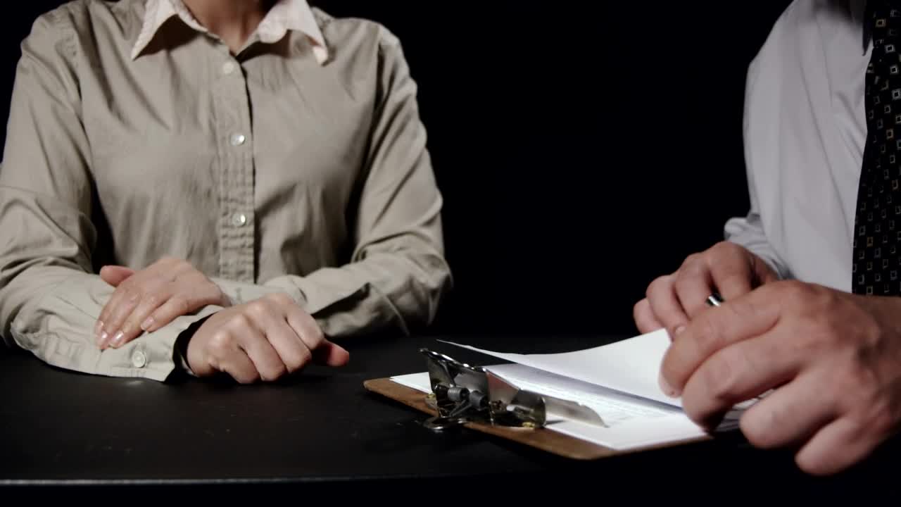 Stock Video Looking At Reports On A Clipboard Animated Wallpaper