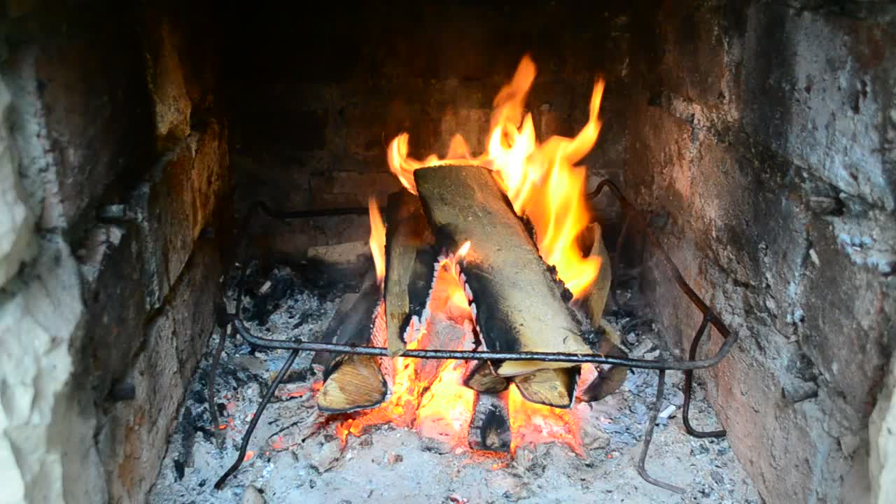 Stock Video Log Fire Burning Inside Animated Wallpaper
