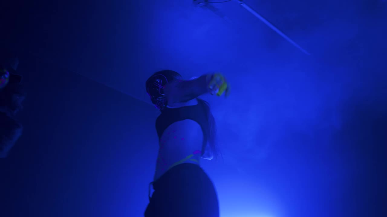 Stock Video Lively Dance Of A Group Of Dancers In The Dark Animated Wallpaper