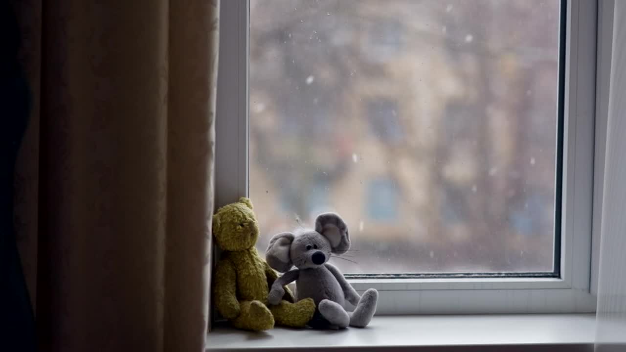 Stock Video Little Toys In The Window In Winter Animated Wallpaper