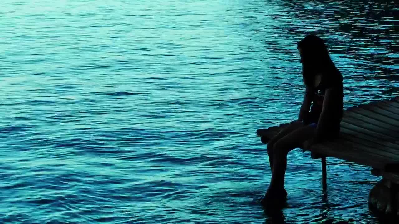 Stock Video Little Girl Wetting Her Feet On The Pier Animated Wallpaper