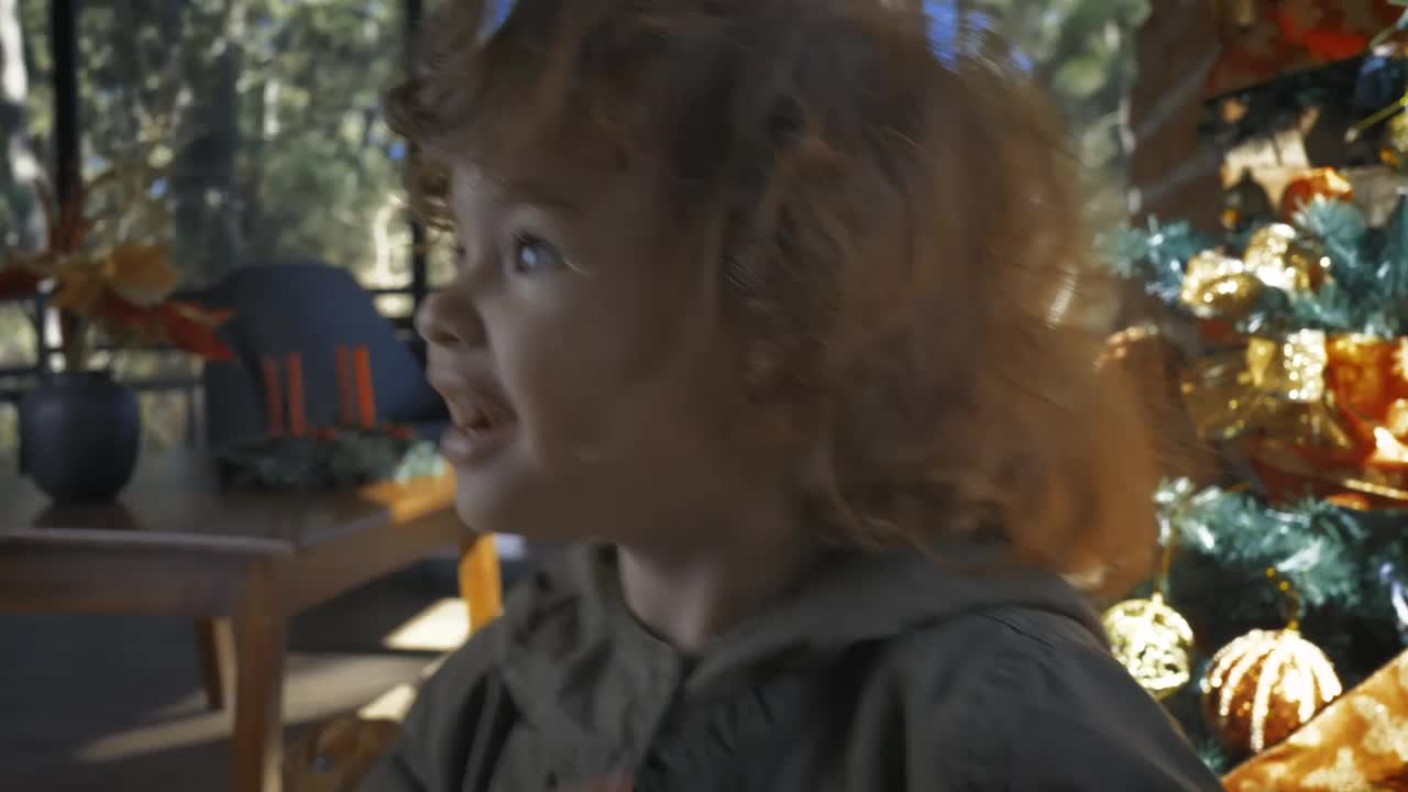 Stock Video Little Girl Very Excited On Christmas Morning Animated Wallpaper