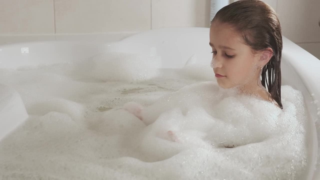 Stock Video Little Girl Taking A Bath In The Jacuzzi Animated Wallpaper