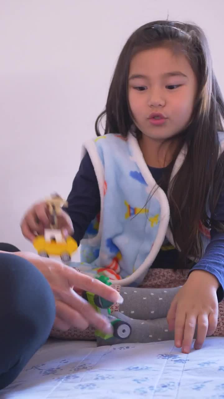 Stock Video Little Girl Playing With Her Mom Animated Wallpaper