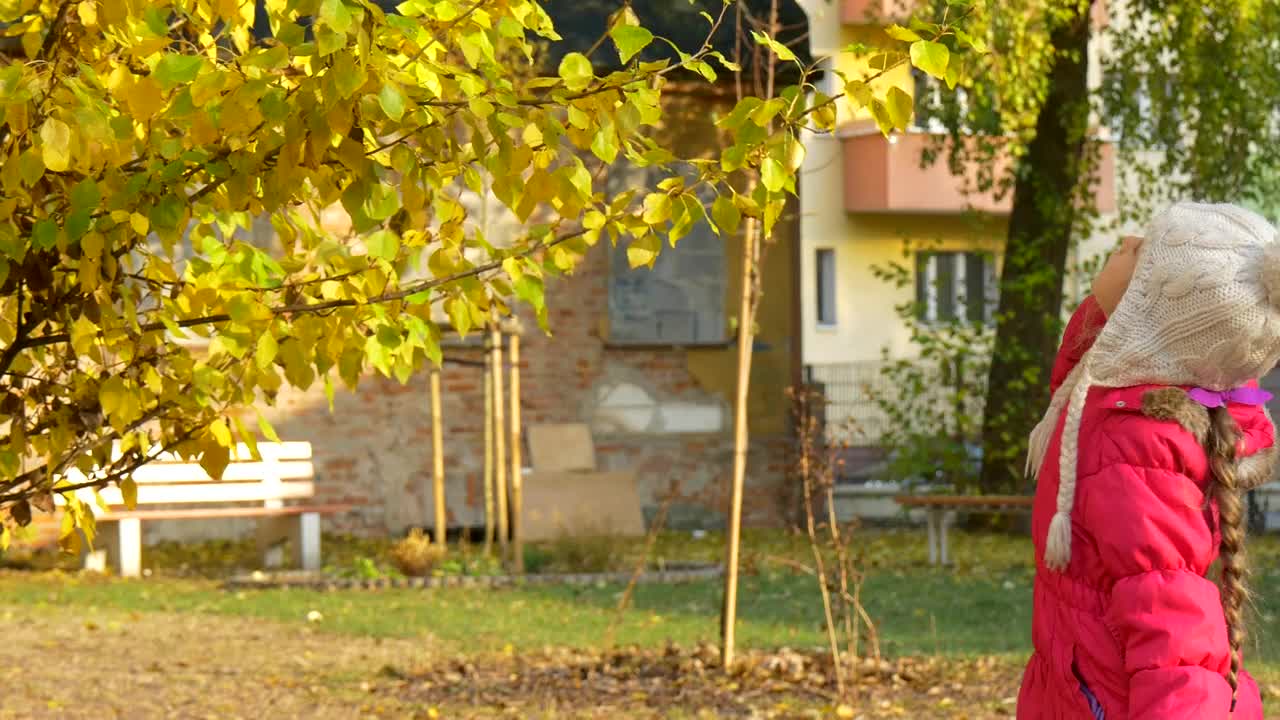 Stock Video Little Girl Playing In The Garden Animated Wallpaper