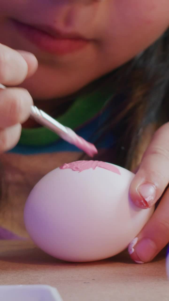 Stock Video Little Girl Paints Easter Eggs Close Up Animated Wallpaper