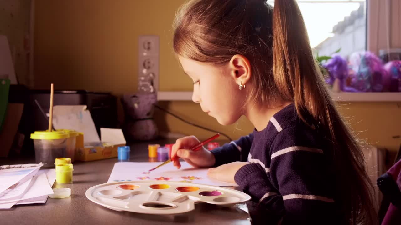 Stock Video Little Girl Painting At Home Animated Wallpaper