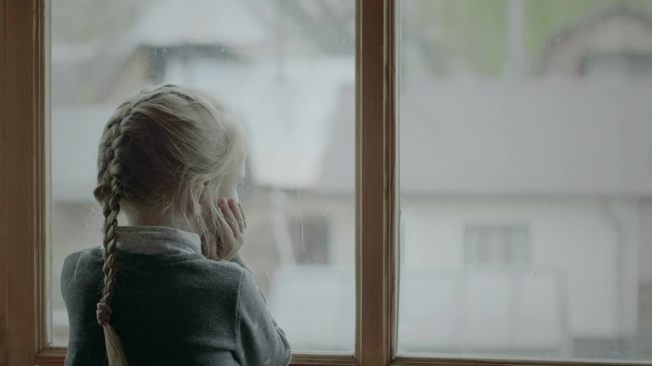 Stock Video Little Girl Looking Outside The Window Animated Wallpaper