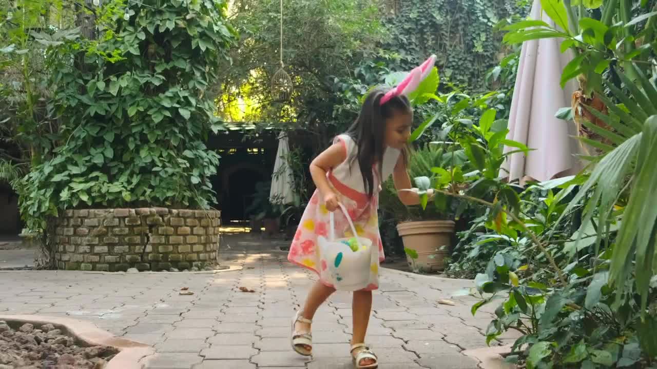 Stock Video Little Girl Collecting Easter Eggs Animated Wallpaper