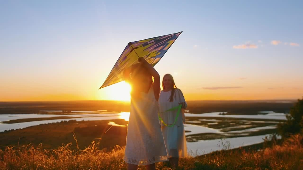 Stock Video Little Girl And Her Mom Running With A Kite At Animated Wallpaper