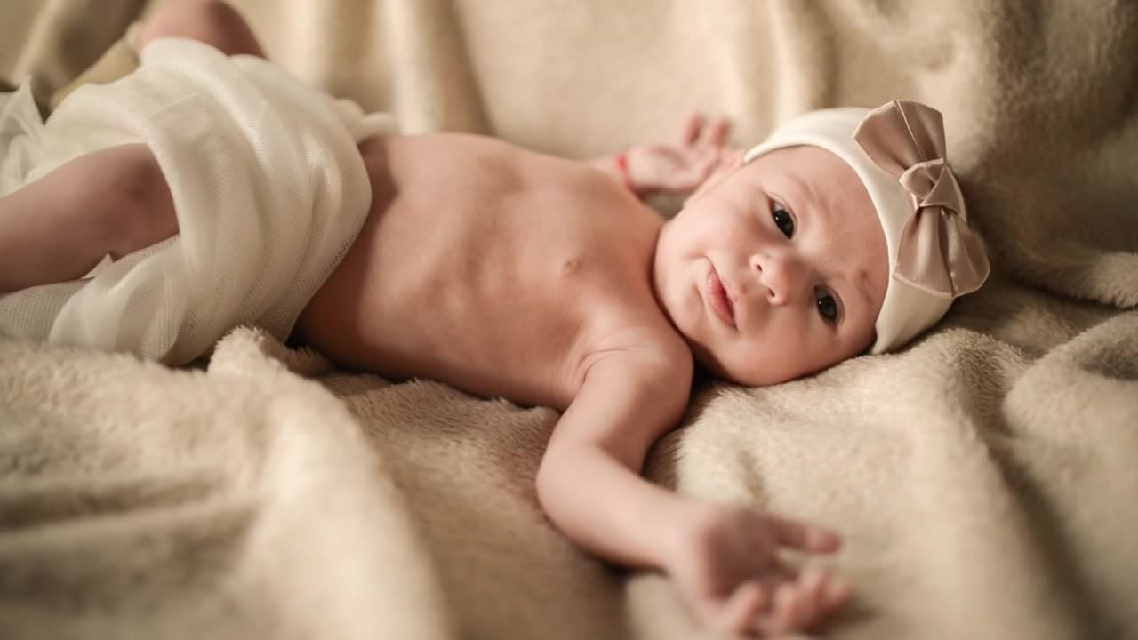Stock Video Little Female Baby In Bed Animated Wallpaper