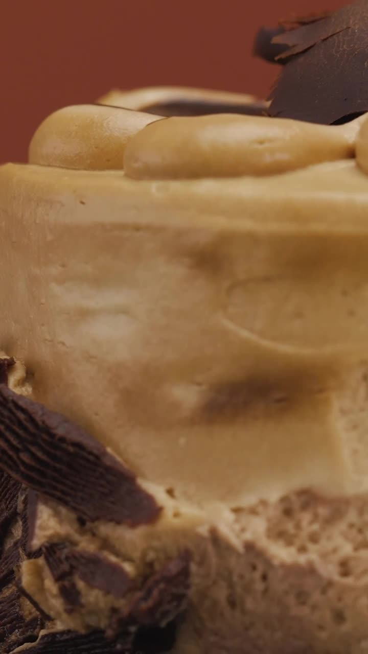 Stock Video Little Chocolate Cake Slowly Rotating Animated Wallpaper