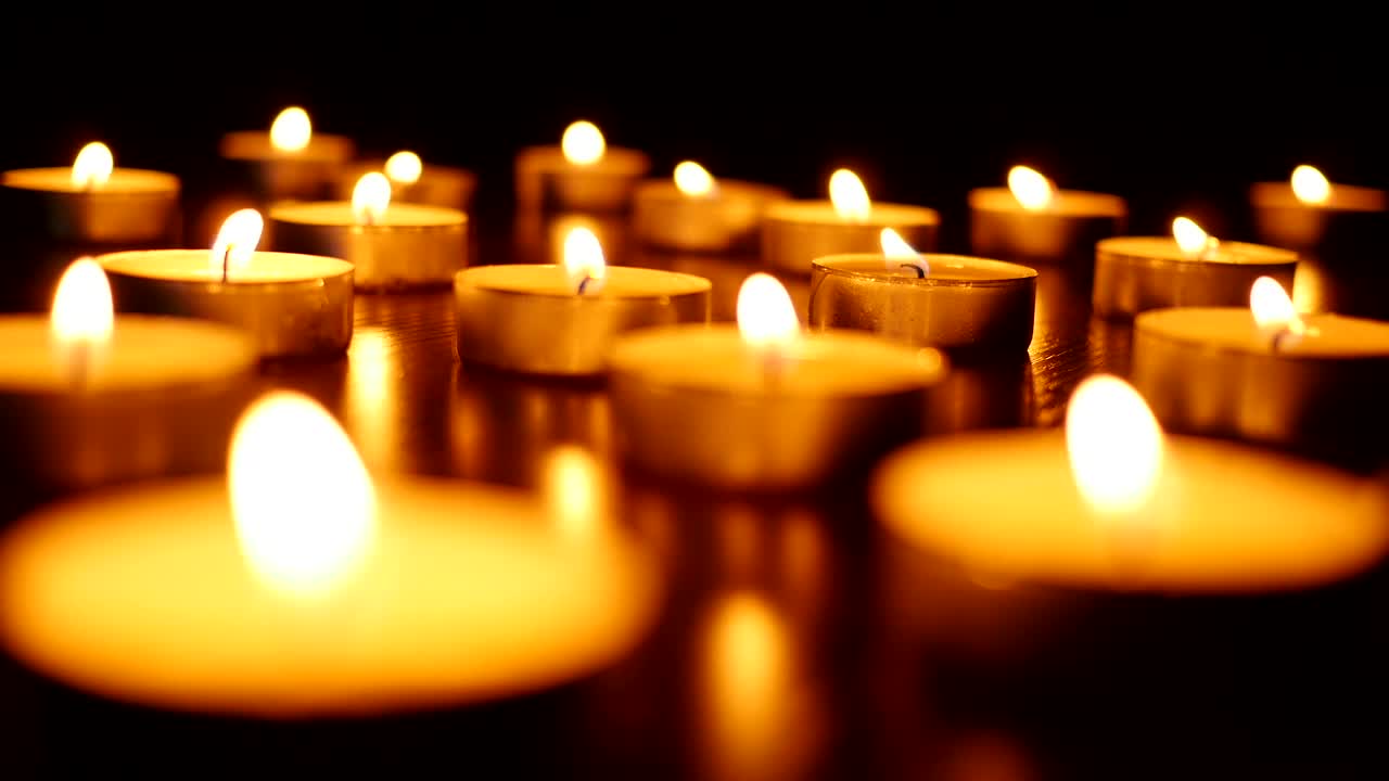 Stock Video Little Candles Burning In The Dark Animated Wallpaper