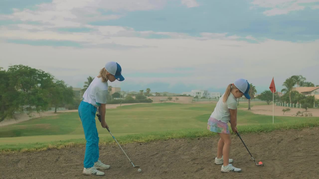 Stock Video Little Brothers Playing Golf Animated Wallpaper