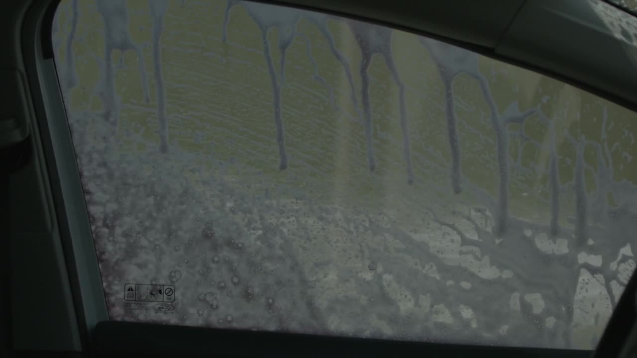 Stock Video Little Boy Is Cleaning A Window Car Animated Wallpaper