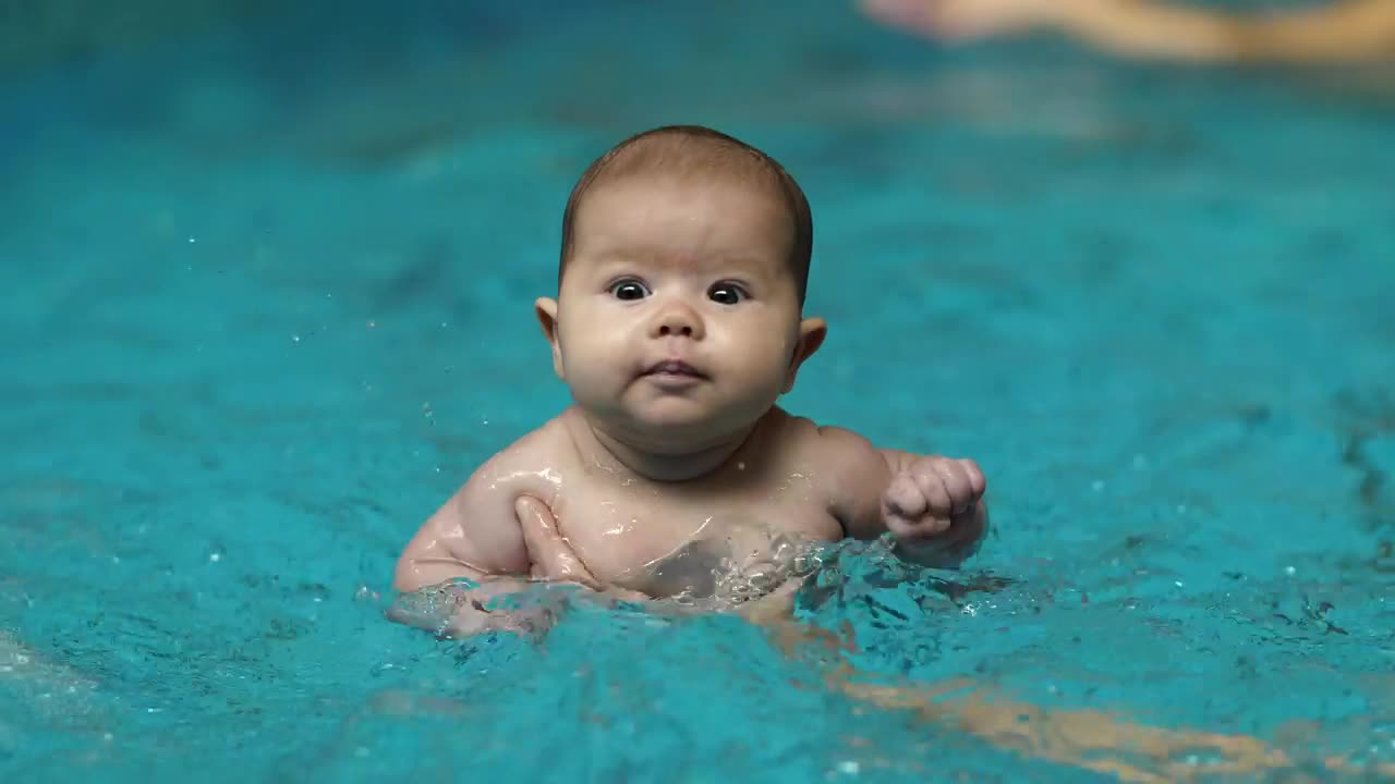 Stock Video Little Baby Learning To Swim In A Pool Animated Wallpaper
