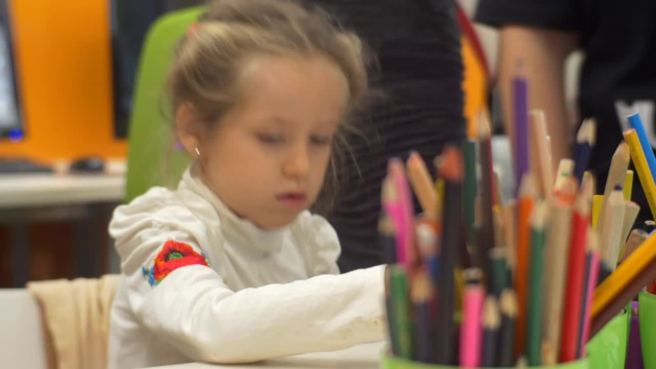 Stock Video Littel Girl Working On The Classroom Animated Wallpaper